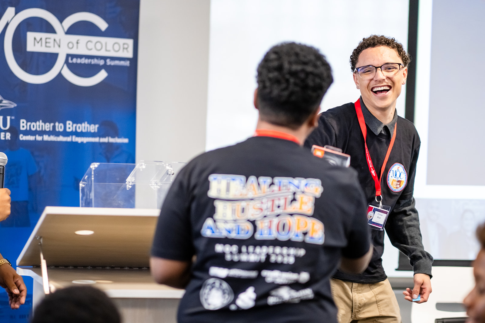 Students smiling and shaking hands
