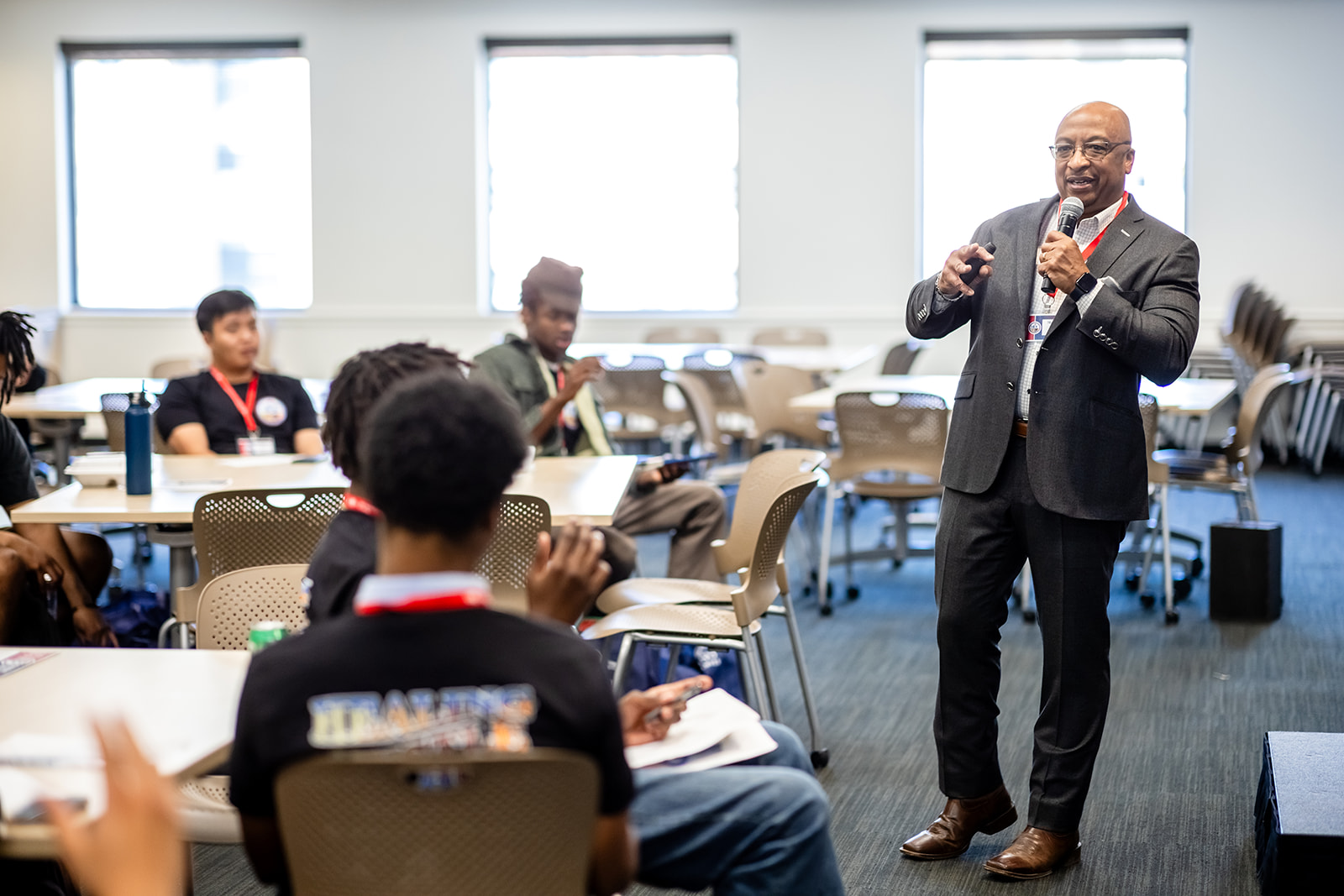 Staff lecturing students