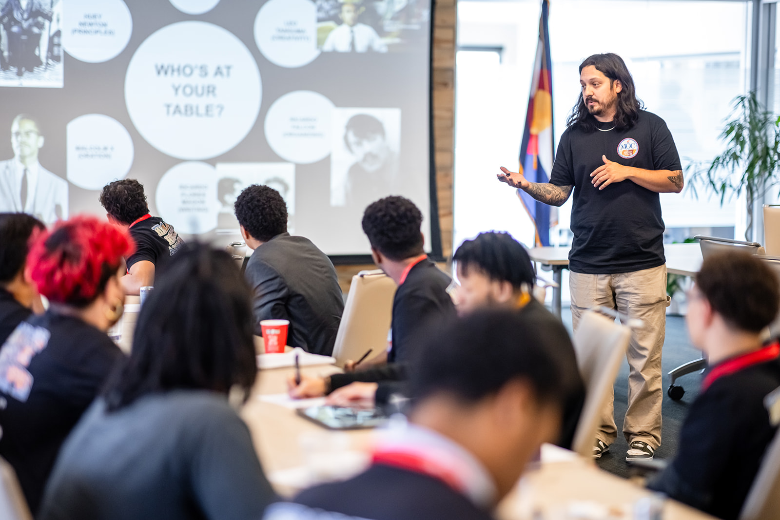 Presenter showing presentation to students