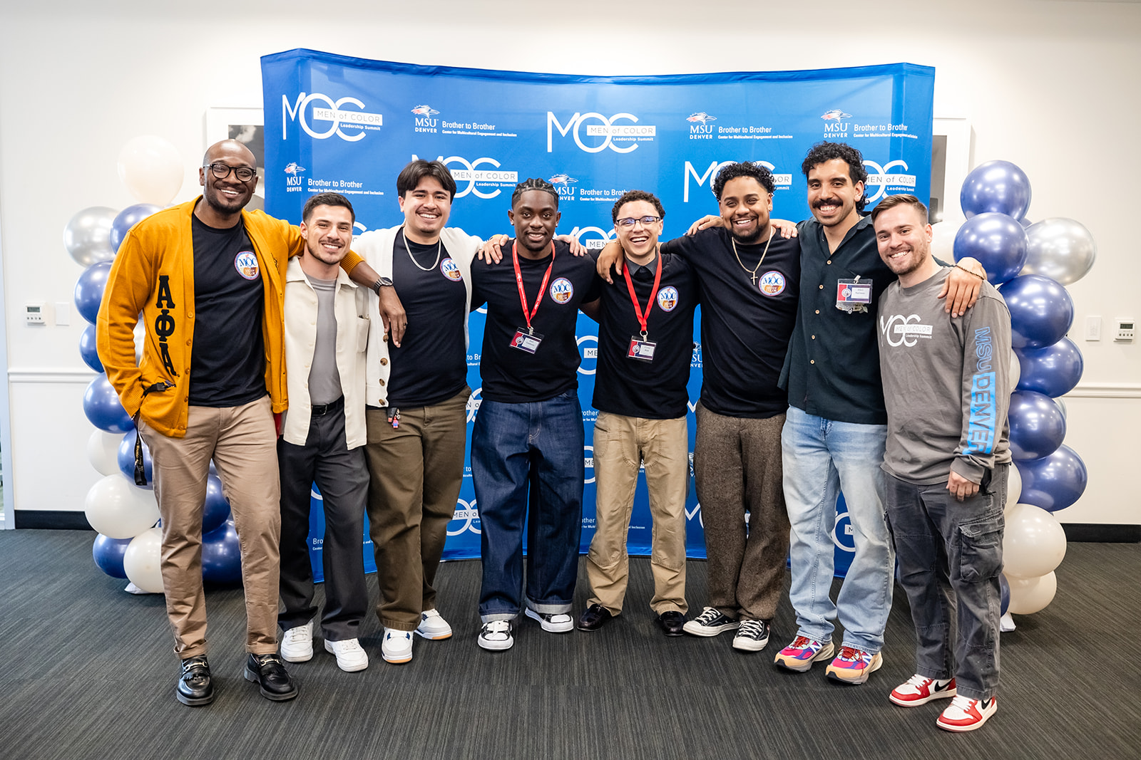 Group of staff smiling for a photo