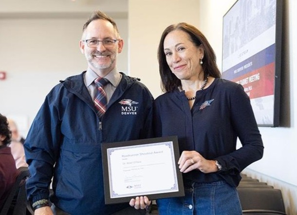 Dr. Brian O'Hara receiving the February 2026 Roadrunner Shoutout Award from Dr. Davidson.