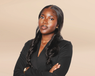 MSU Denver student Hawa Tallo Sow poses for a headshot wearing a black suit.