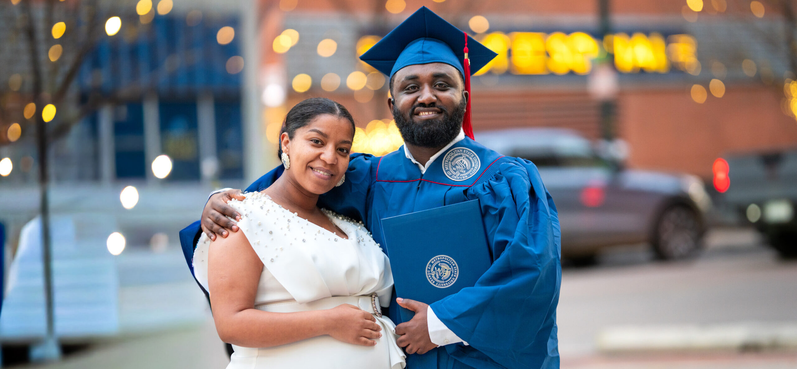 Graduates gather with families after commencement.