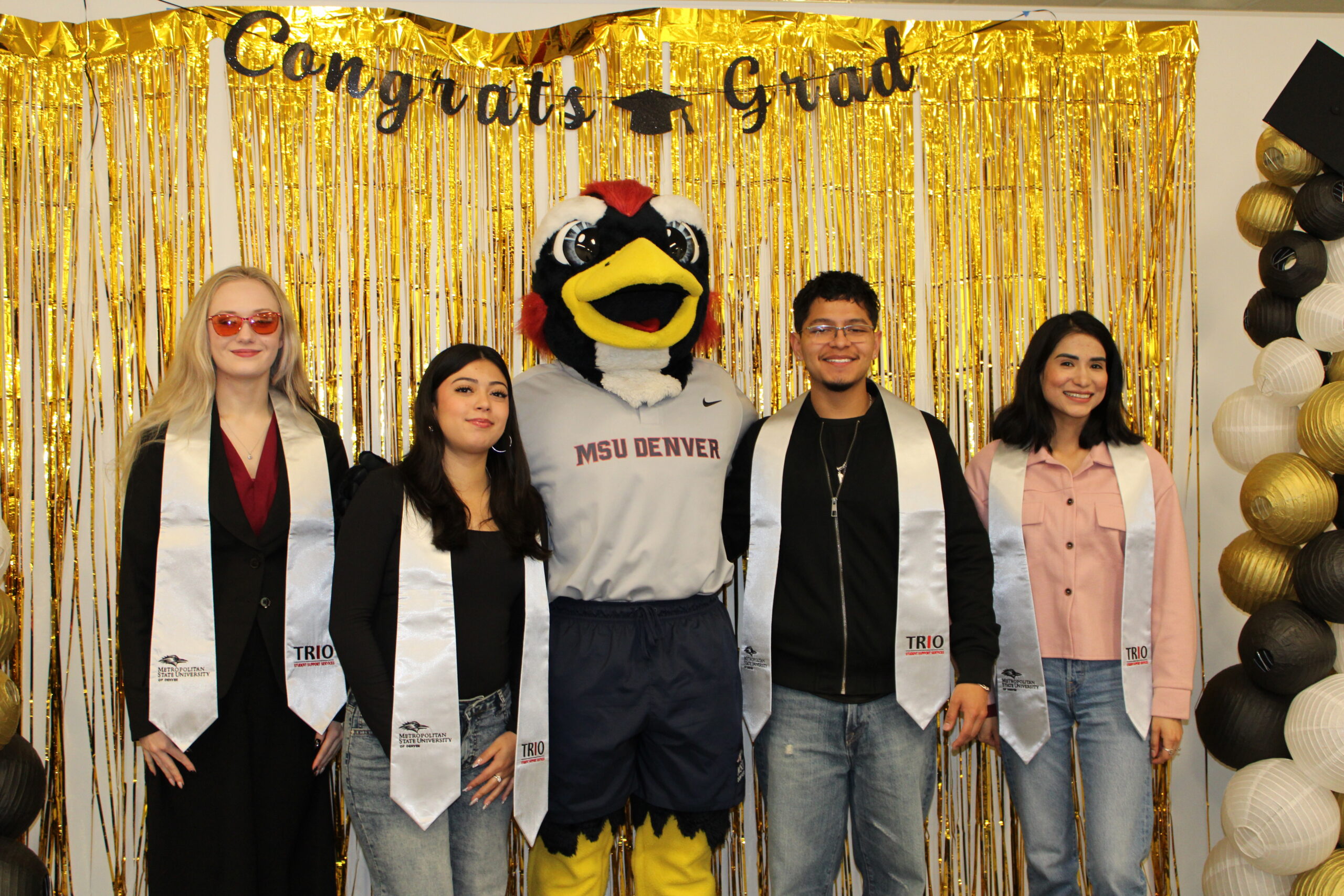 TRIO Spring 26 graduates posing for a picture with Rowdy