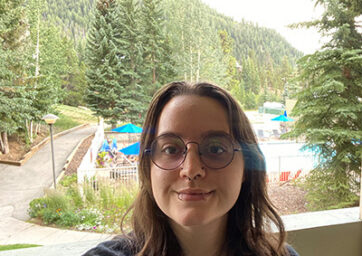 Headshot of Quinn Moore in the mountains