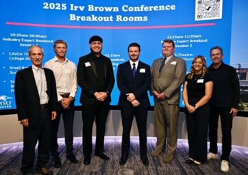 Irv Brown scholars standing with several leaders of the Irv Brown Endowment Fund leadership team