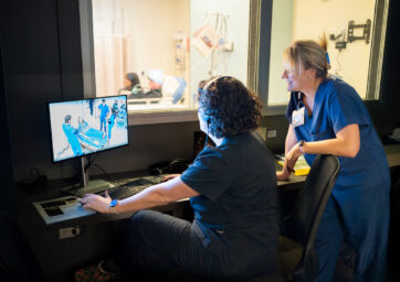 Nursing Skill Lab Coordinator, Kelli Valdivieso, (Left) and MSU Denver’s Director of Interprofessional Simulation and Skills Hub, Mary Tucker, (Right) evaluate MSU Denver nursing student performance