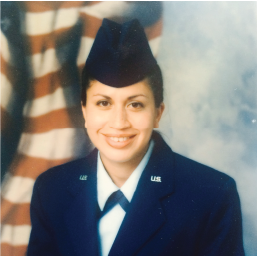 Woman in military clothing and hat