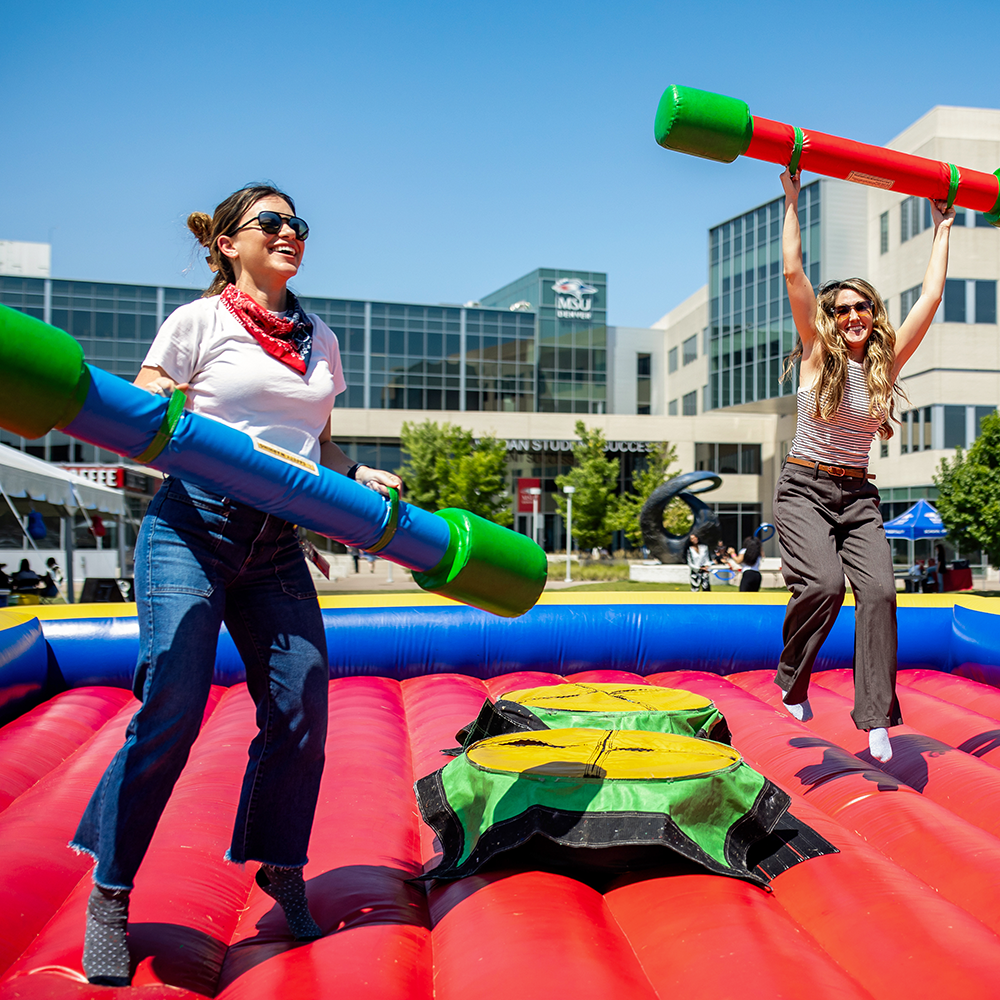 MSU Denver Students on a bounce pad during welcome week