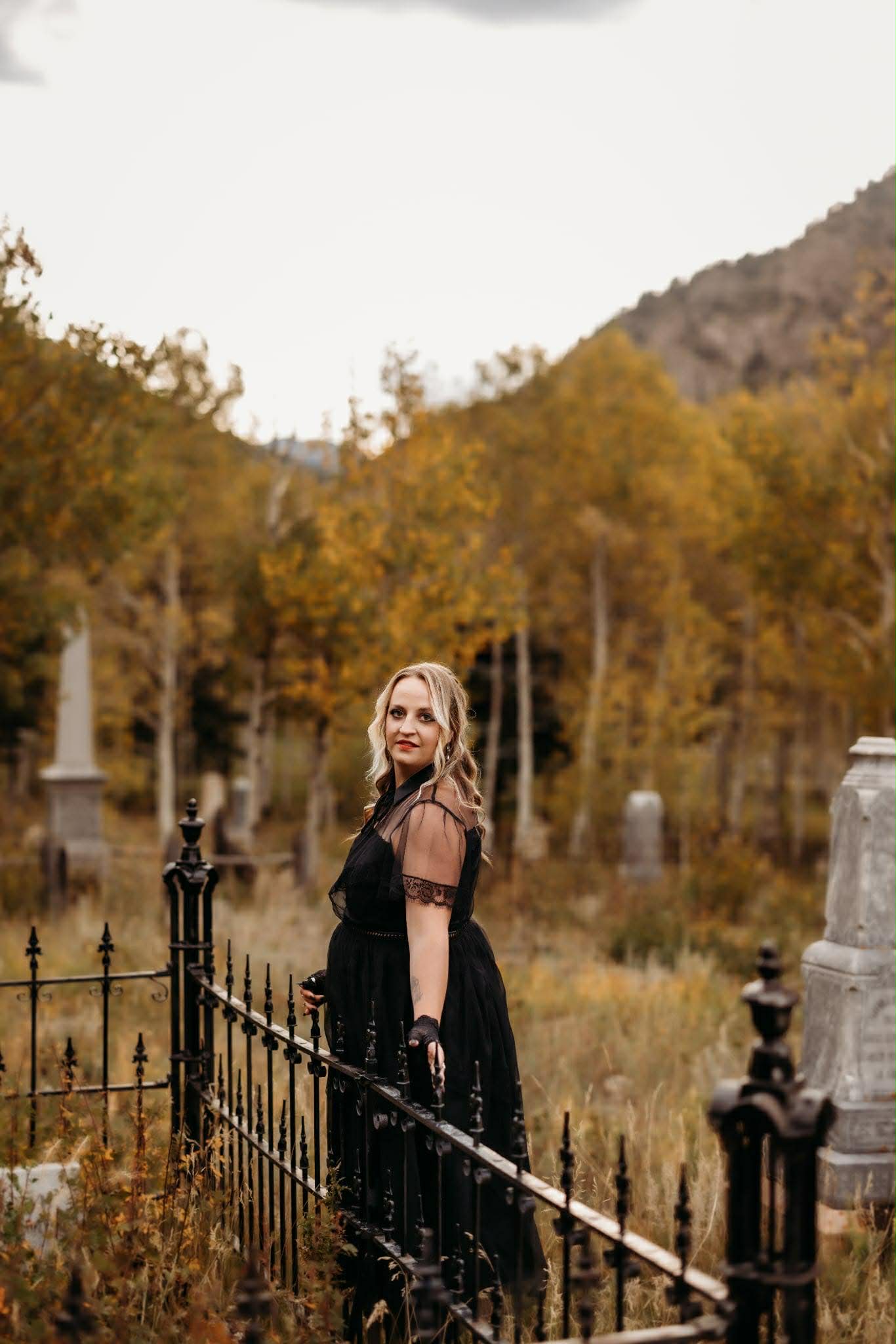 Jasmine Robertson standing in graveyard