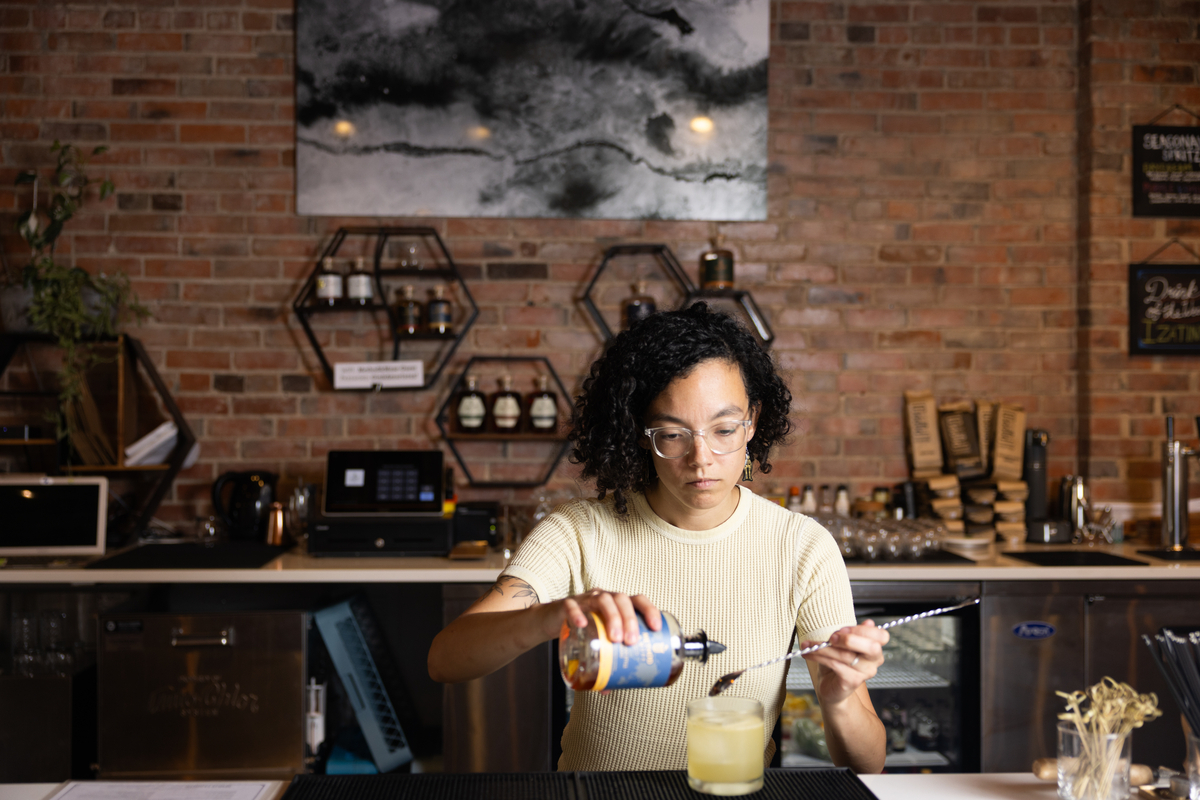 MSU Denver hospitality student making cocktails.