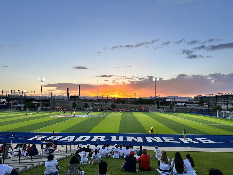 Sunset over soccer field at Homecoming 2024