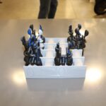 Chess set for the moon featuring clip-on chess pieces.