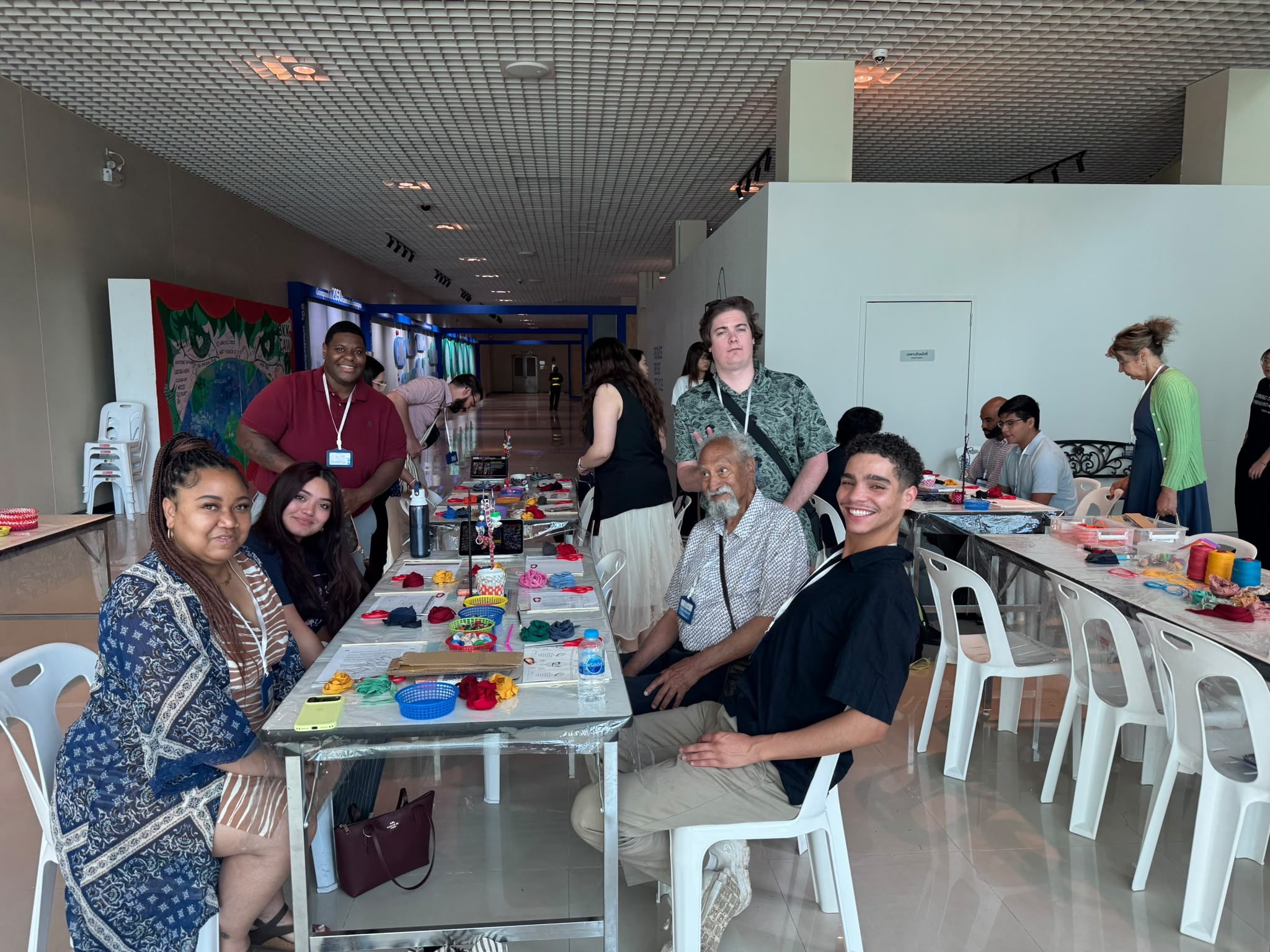 A group picture of students in a company visit making crafts in Thailand