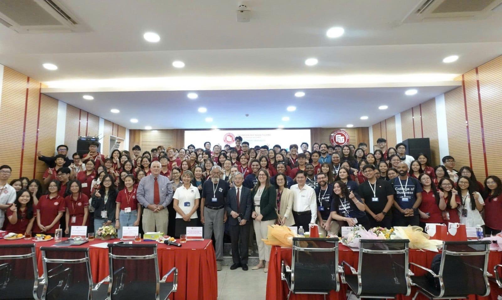 Group picture of MSU Denver and the University of Vietnam students smiling together.