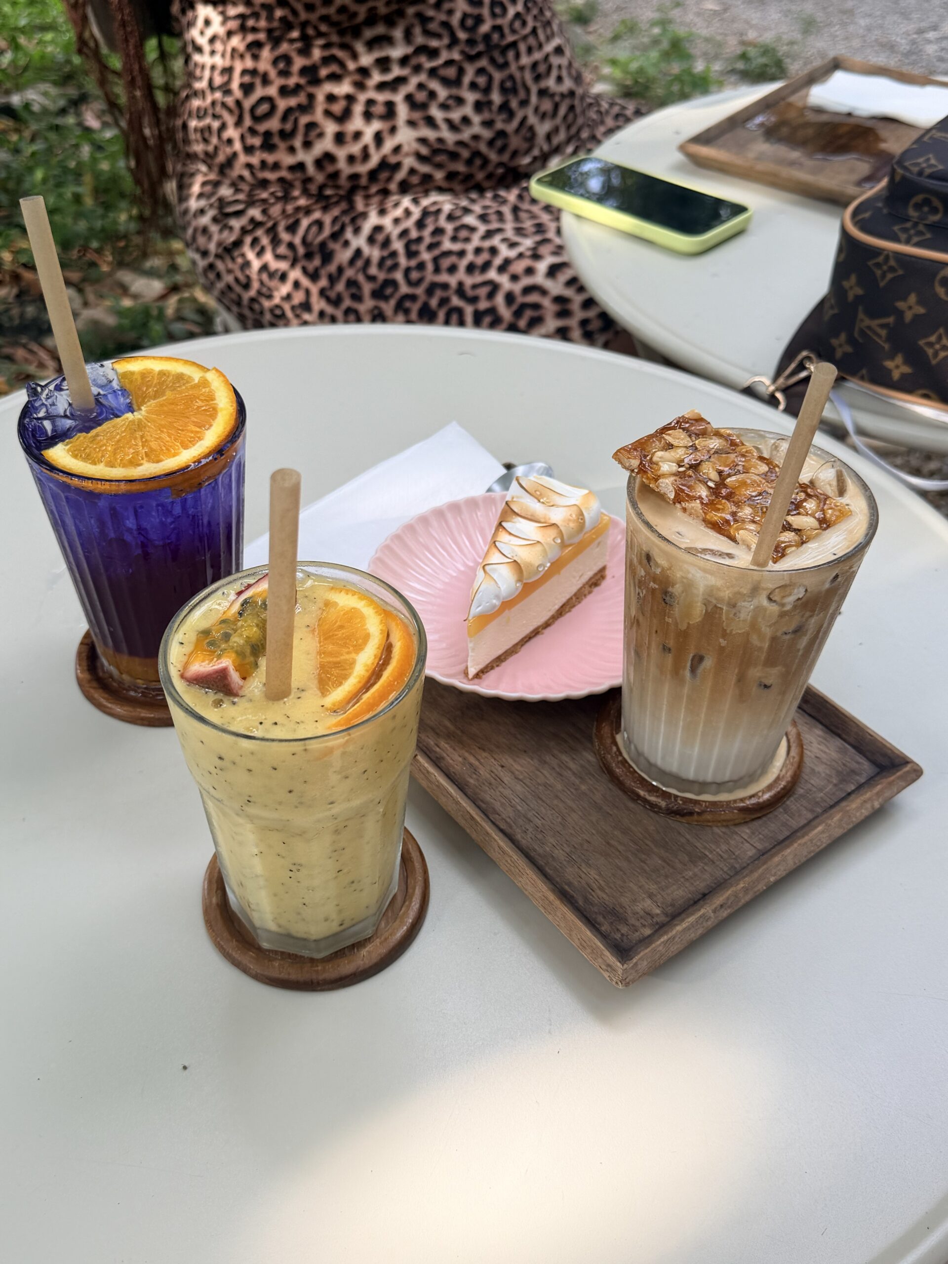 Passionfruit and mango smoothie and Coffee with a pastry in Thailand Cafe.