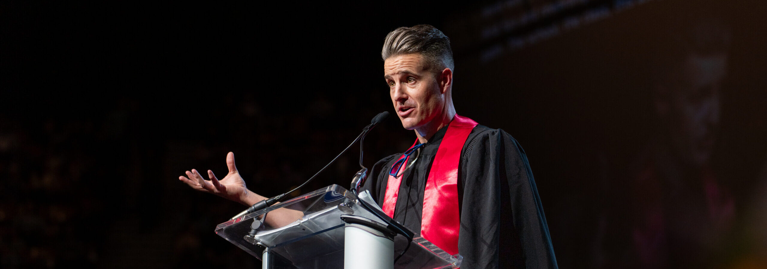 Commencement Keynote Speaker, Stephen Lease, on stage at Commencement addressing the Spring 2026 class