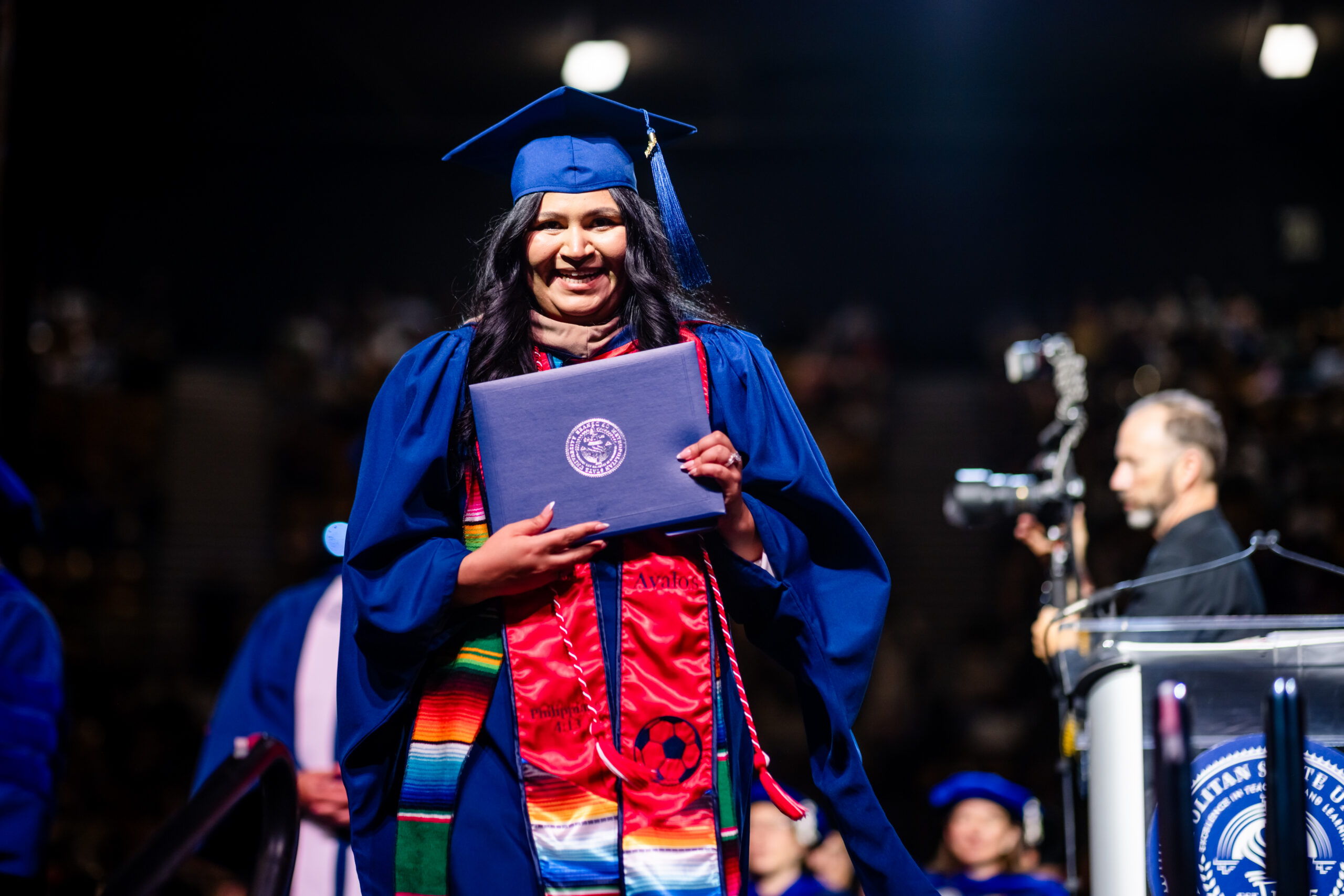 MPAcc grad, Lilia, crosses the stage at the university’s morning commencement ceremony on May 15, 2026.