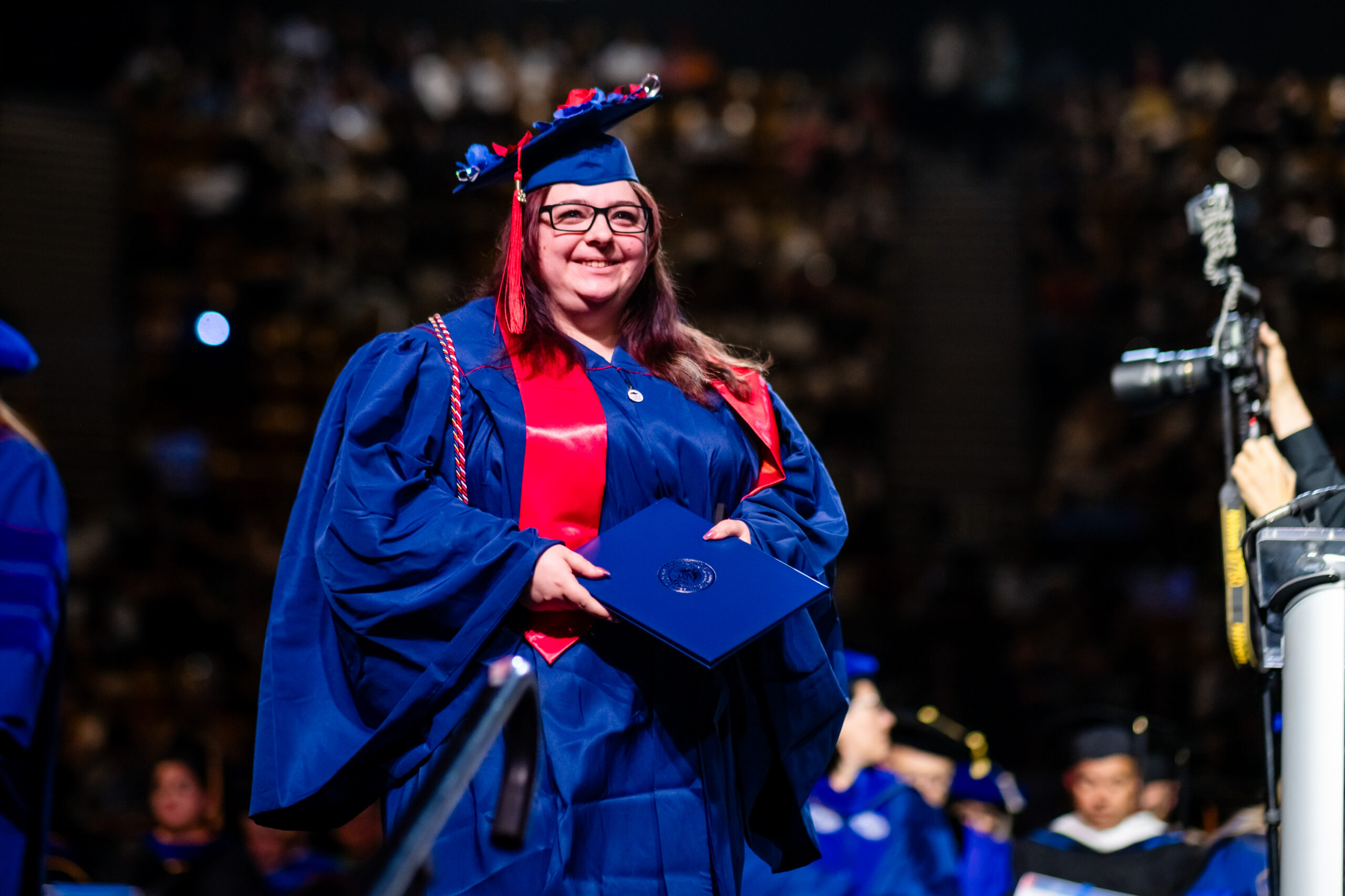 MSU Denver accounting graduate crosses the stage at the university’s morning commencement ceremony on May 15, 2026.