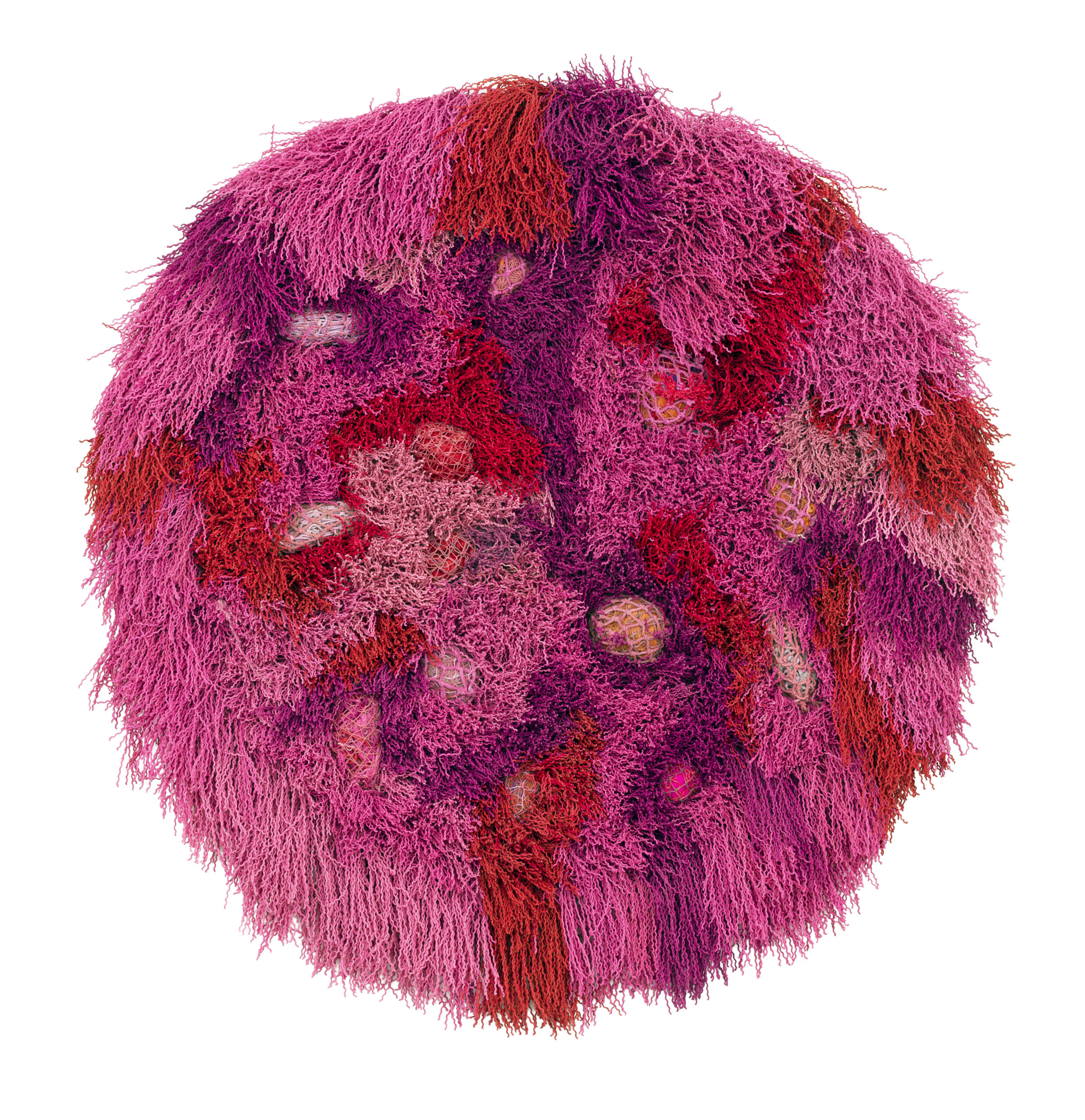 Round art piece with fibrous texture in pink and crimson tones.