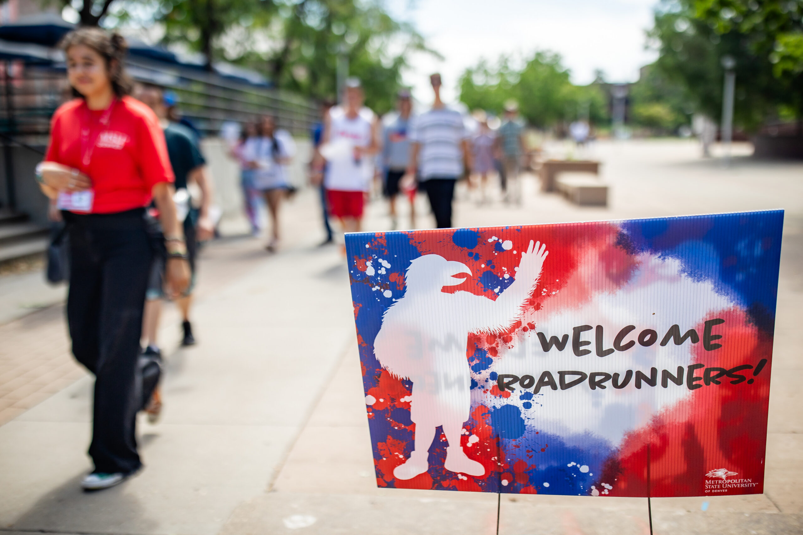 Convocation - blue and red sign with white silohuette of Rowdy