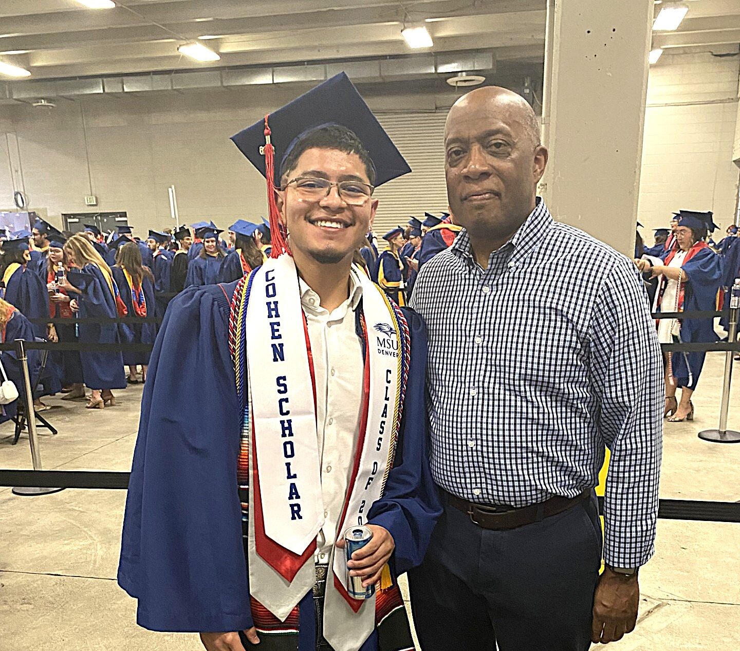 Outstanding Accounting Student award recipient in regalia smiling with Russell Noles backstage at SP'26 Commencement Ceremony