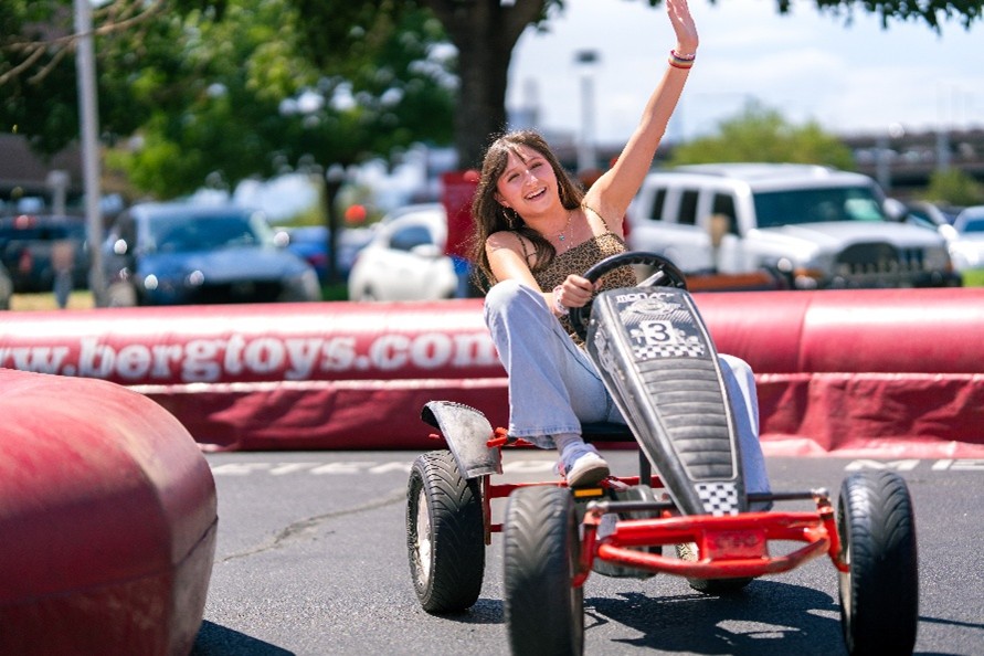 Student riding go-cart