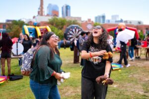 Students laughing at carnival