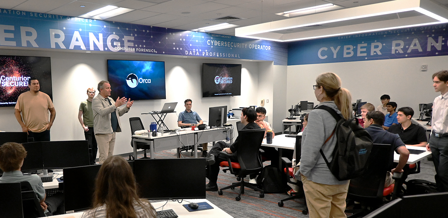 The Cybersecurity Center during a range exercise briefing with a local high school program.