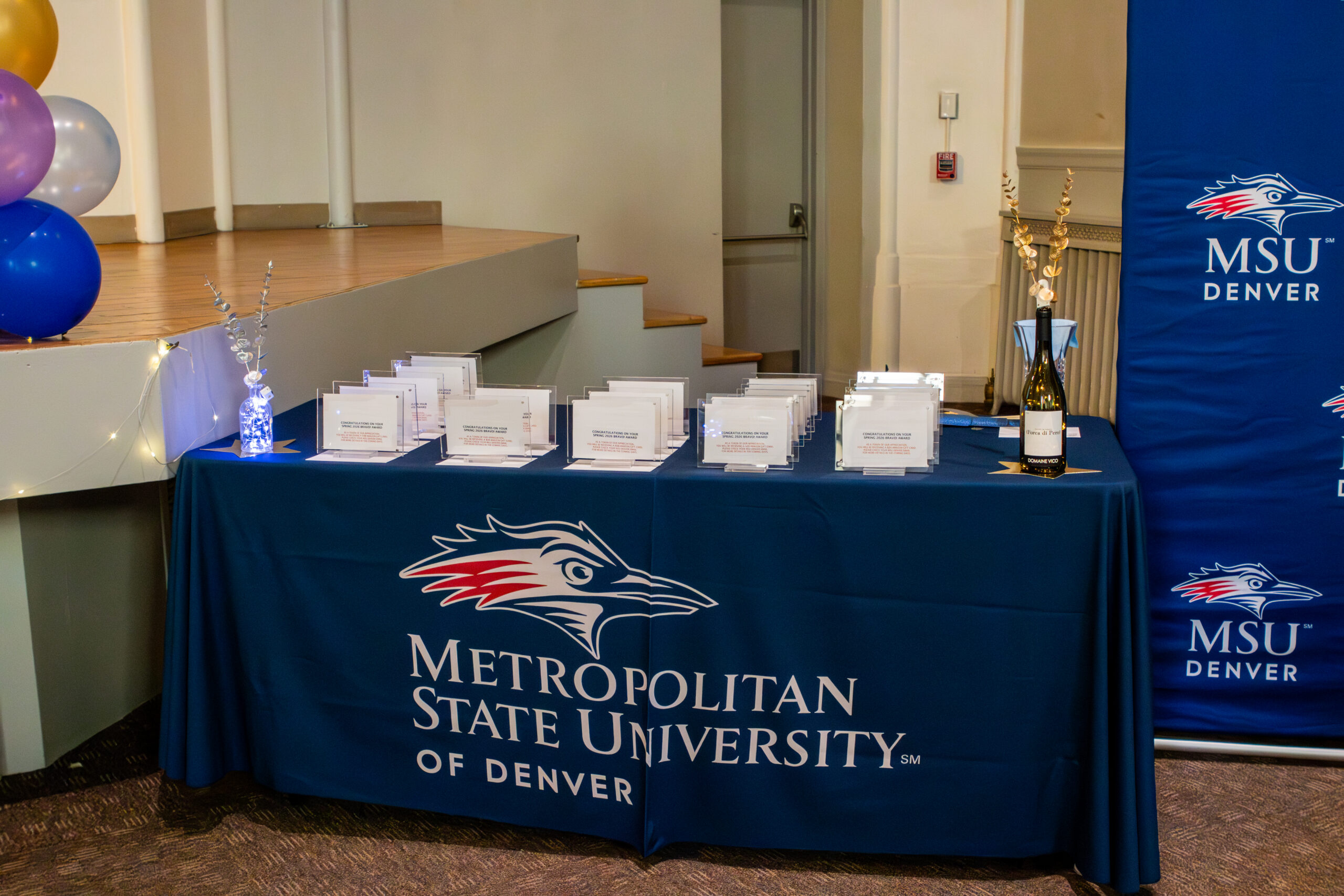 Table full of BRAVO! awards.