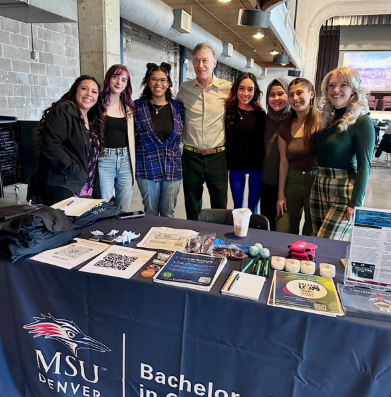 Students posing with a Colorado Senator