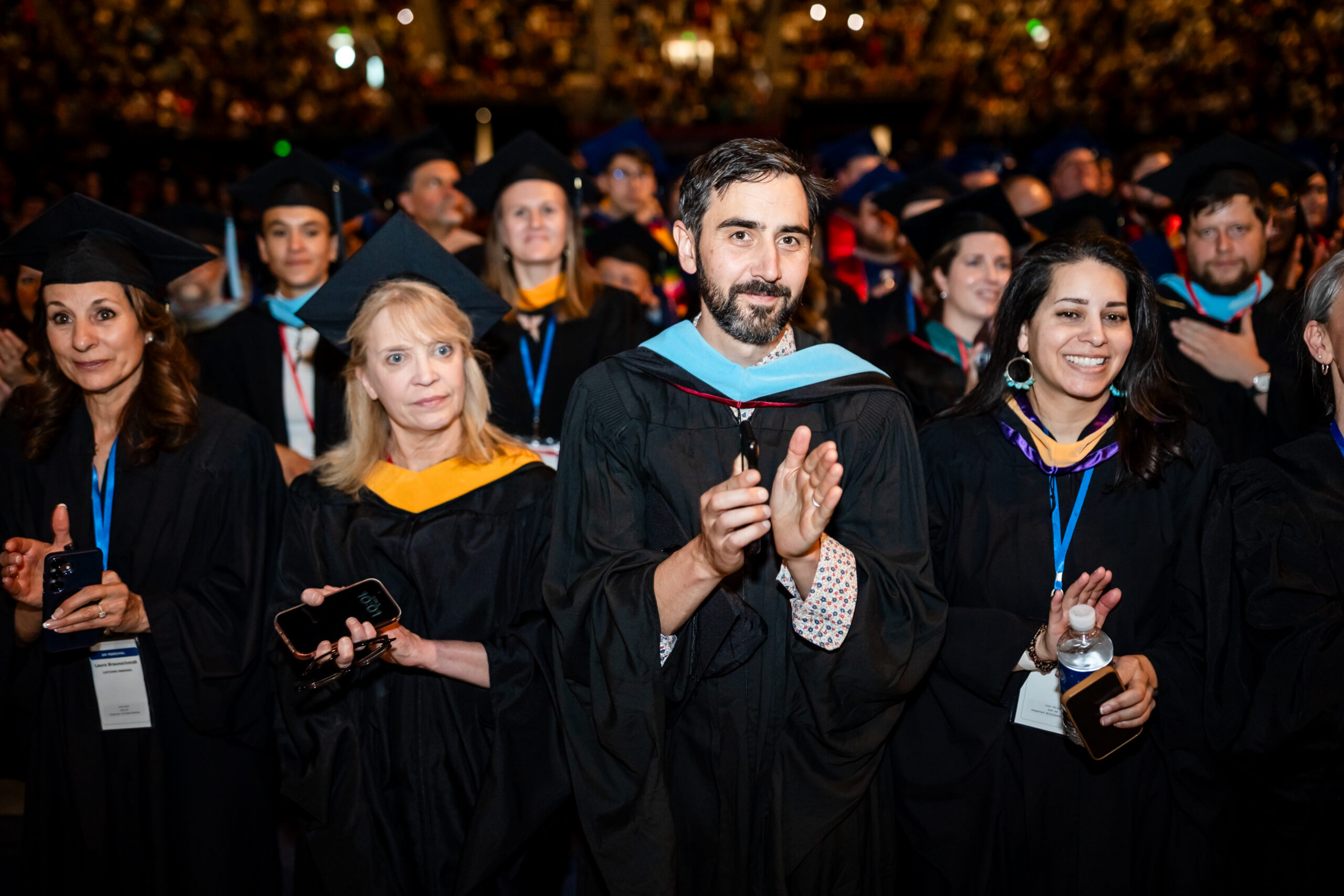 Staff and faculty marshals stand during the Commencement ceremony
