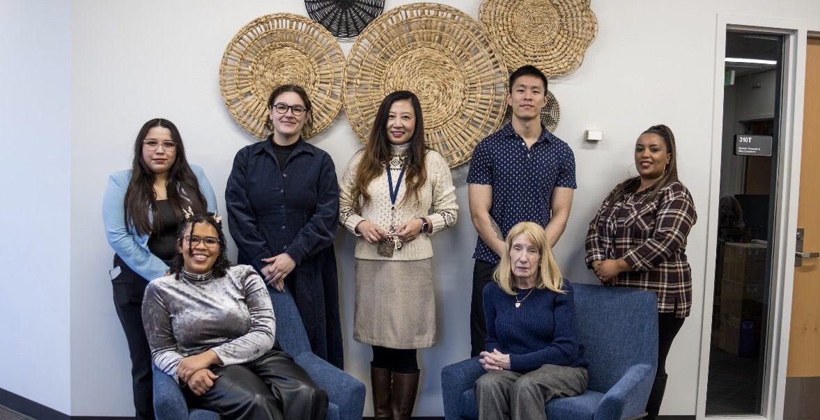 Group of students with faculty