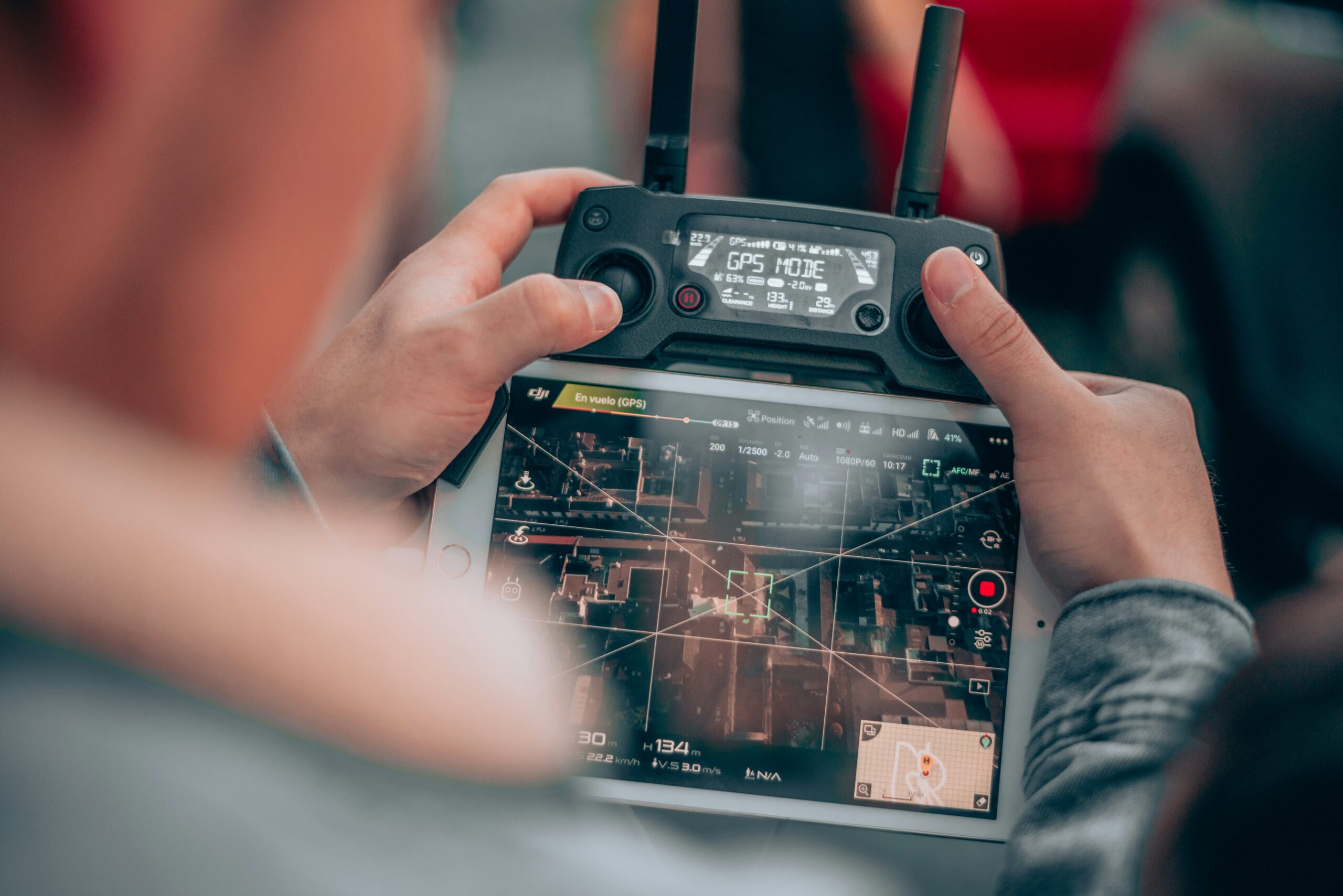 A drone operator viewing a remote screen.