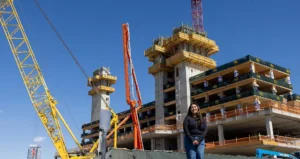 MSU Denver Civil Engineering Technology student and PCL intern Claudia Carrillo on the site of MSU Denver's Summit House. Photo by Amanda Schwengel