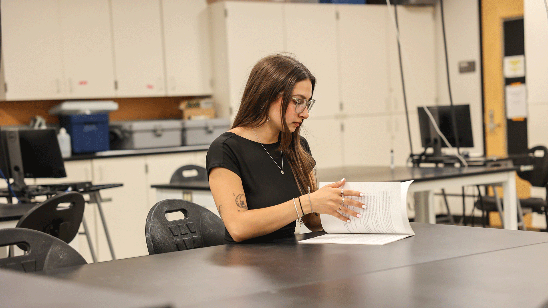 Elena Herrera studying in a lab