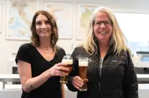 Colleen Haynes (left) with Flying Dog Brewery President Kelly McElroy in MSU Denver’s School of Hospitality Sensory Analysis Lab. Photo by Steve Juliff