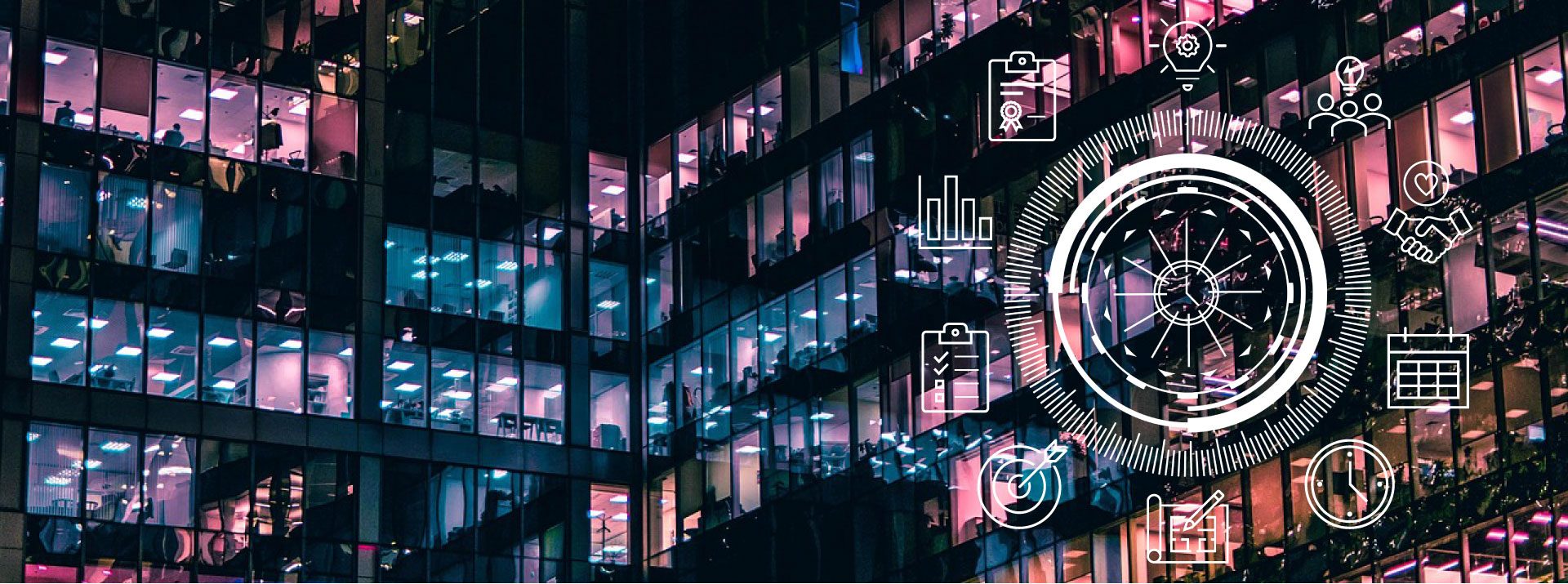 Background of lighted windows of a building; overlay with a circle with a clock in the middle surrounded by project management related icons - lightbulb (ideas), group of people with lightbulb (teamwork), shaking hands with a heart (empathy), calendar (schedule), clock (timing), blueprint (planning), target (milestones), clipboard (management), graph (statistics), clipboard with winning ribbon (testing)