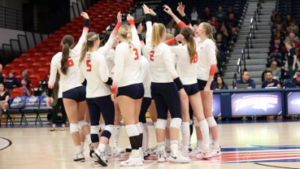 Women's volleyball team group cheer