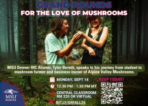 Photo of Tylor and Danielle Bereth smiling while holding a mushroom in a forest.