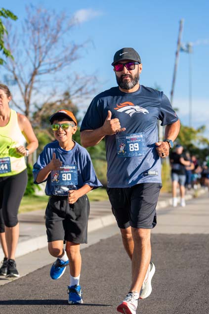 Roadrunners run through Auraria Campus at the 10th annual Roadrunners 5k.