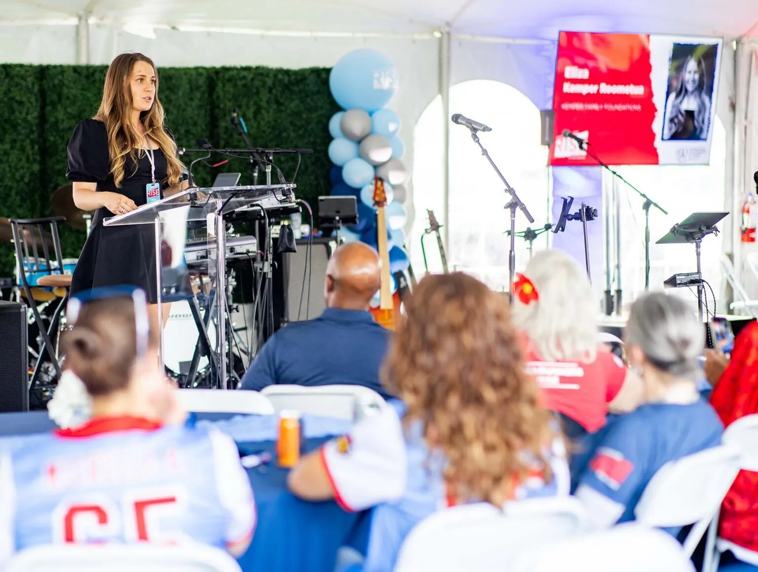 Eliza Kemper Roometua speaks on behalf of her family at the Roadrunners Rise Campaign Celebration. Photo by Alyson McClaran