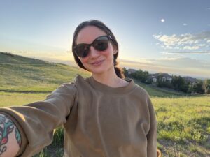 Michaela Meier in front of a field