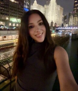 Laura in front of a city scape