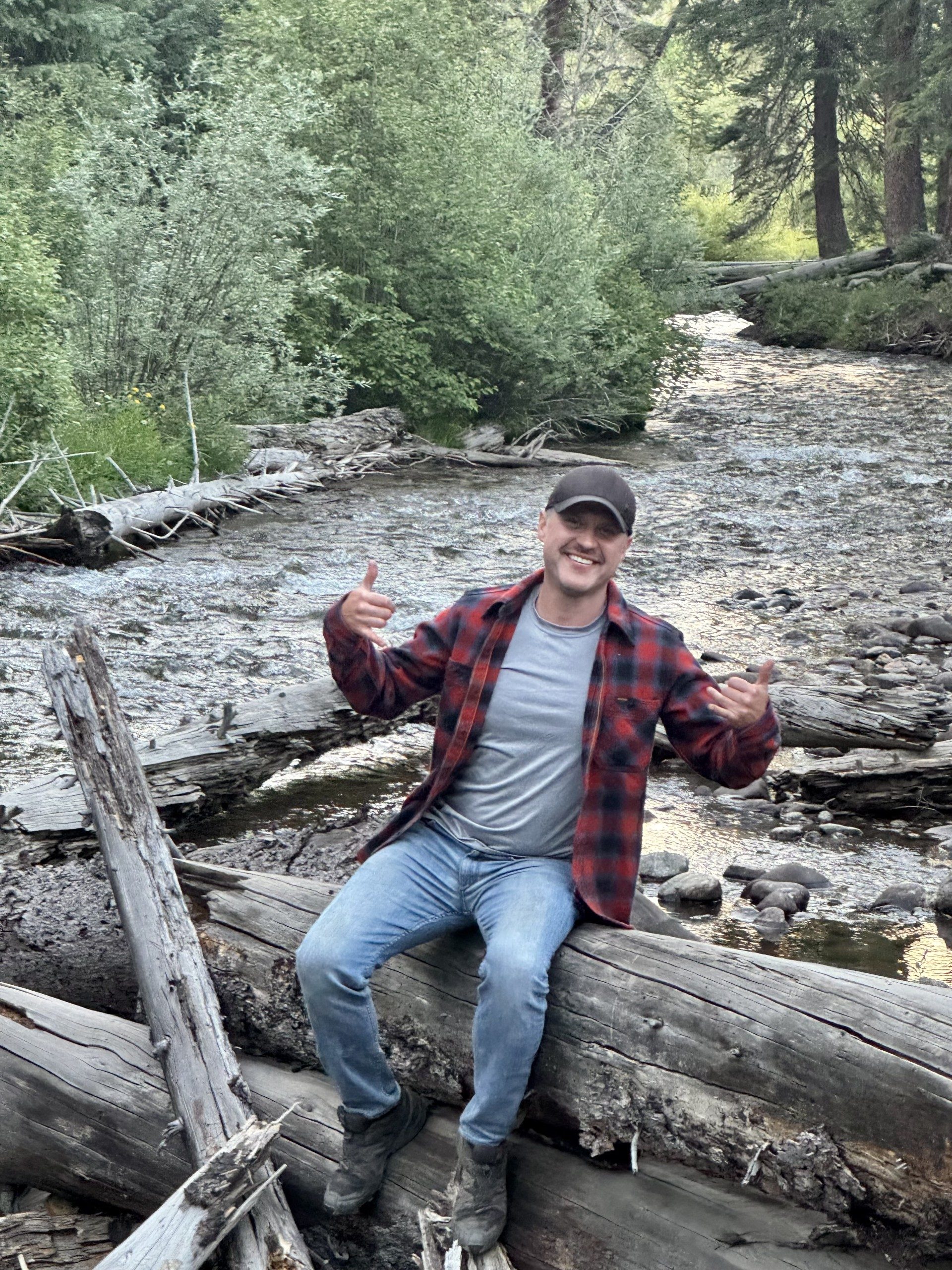 A photo of Rustin Tonn in the woods