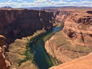 Arizona Colorado River running between natural canyons.