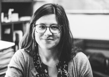 Black and white photo of Dr. Olivia C. Navarro-Farr in office