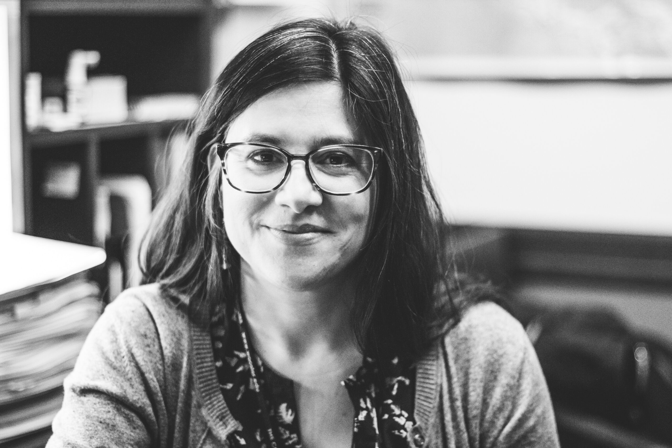 Black and white photo of Dr. Olivia C. Navarro-Farr in office