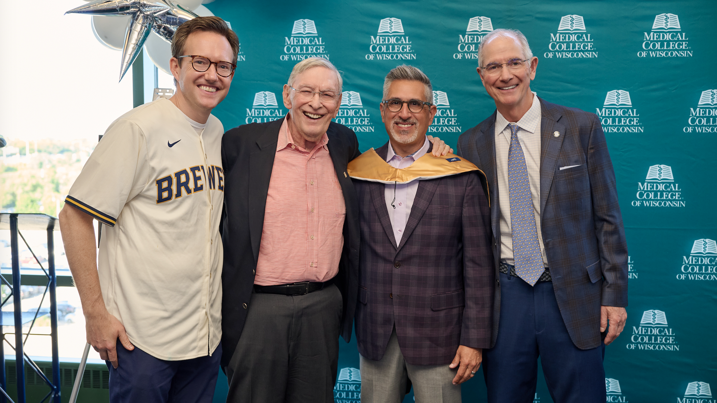 L-R: Dr. Bill Hall, Bob Uecker Chair for Pancreatic Cancer Research at the Medical College of Wisconsin; MLB Commissioner Emeritus Bud Selig; Caplinger; Dr. Doug Evans - at Caplinger's Medical College of Wisconsin honorary doctoral degree conferral, June 2026