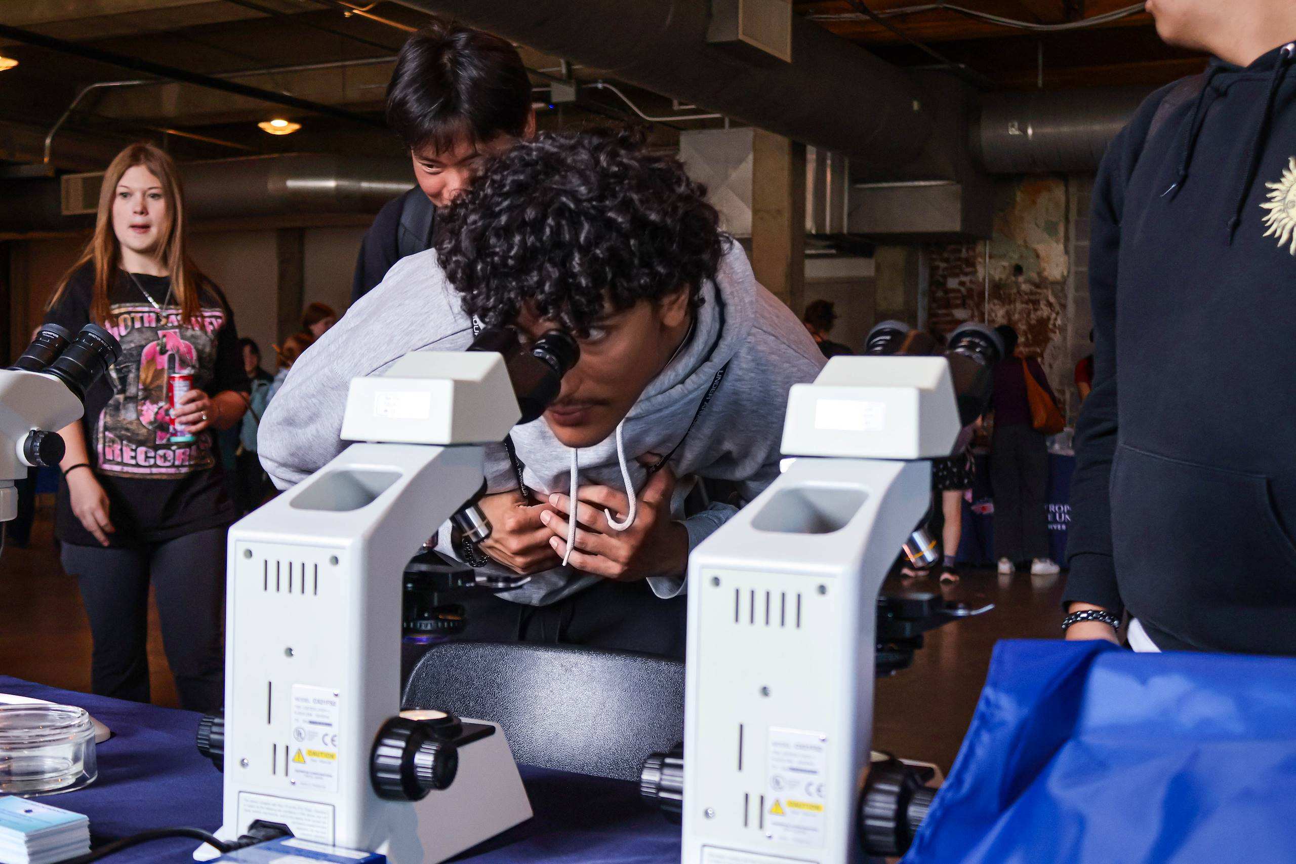 Learning to use a microscope.